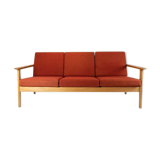 Three seater sofa of oak and red wool fabric designed by Hans J. Wegner