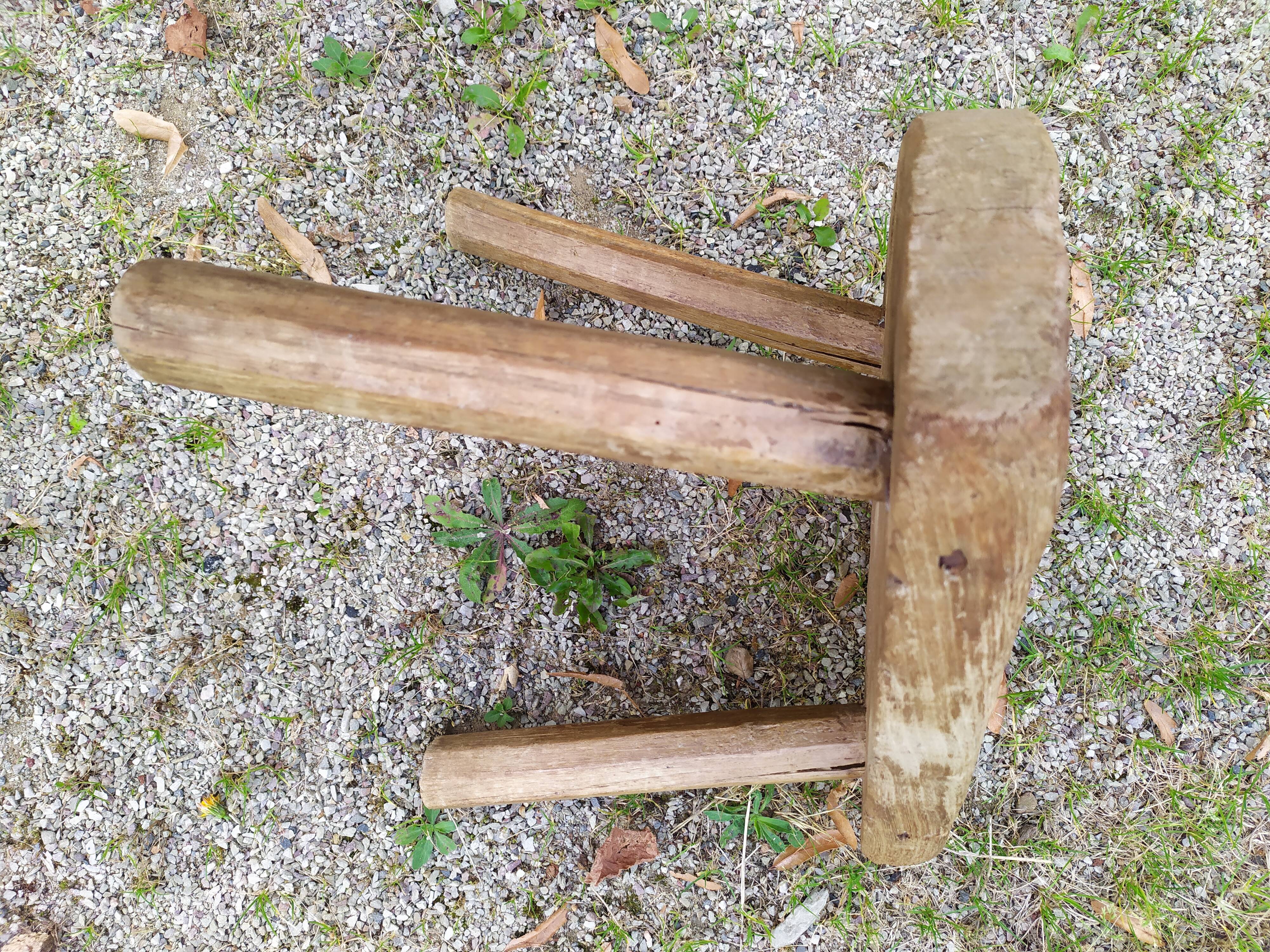 Tripod stool in raw wood