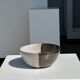 White and glossy brown two-tone ceramic bowl, matt earth