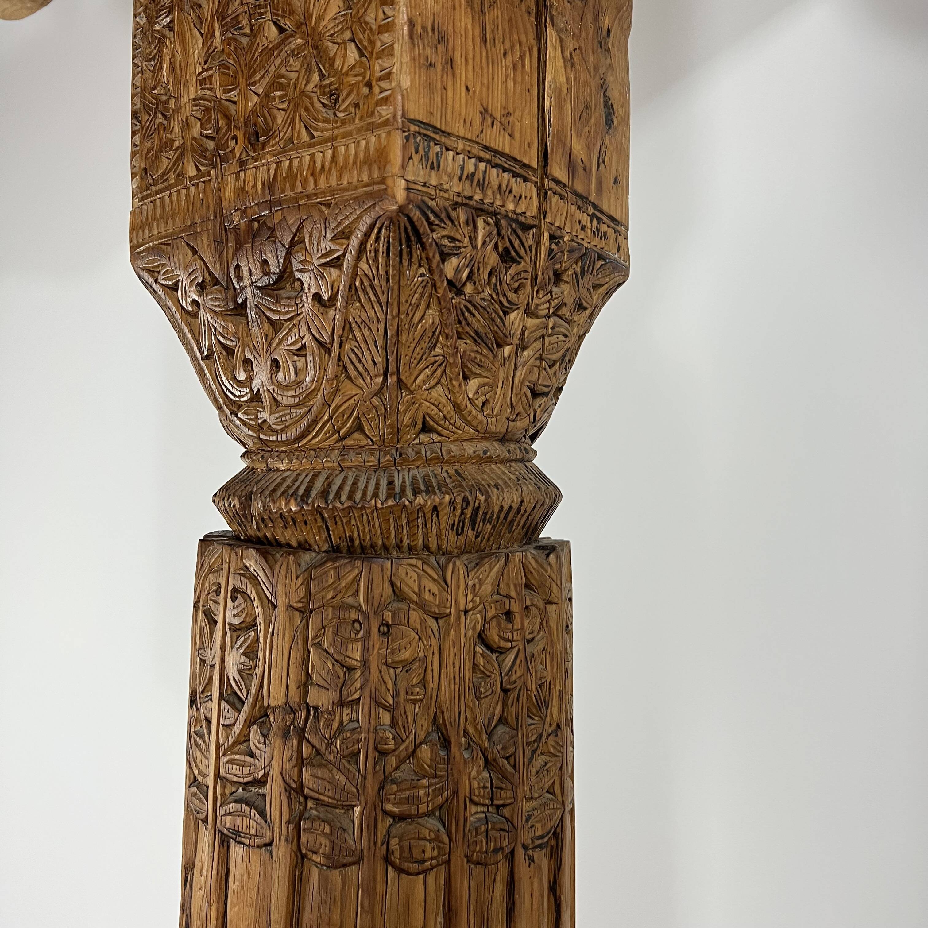 Ancient large carved cedar pillar column from Pakistan, India.