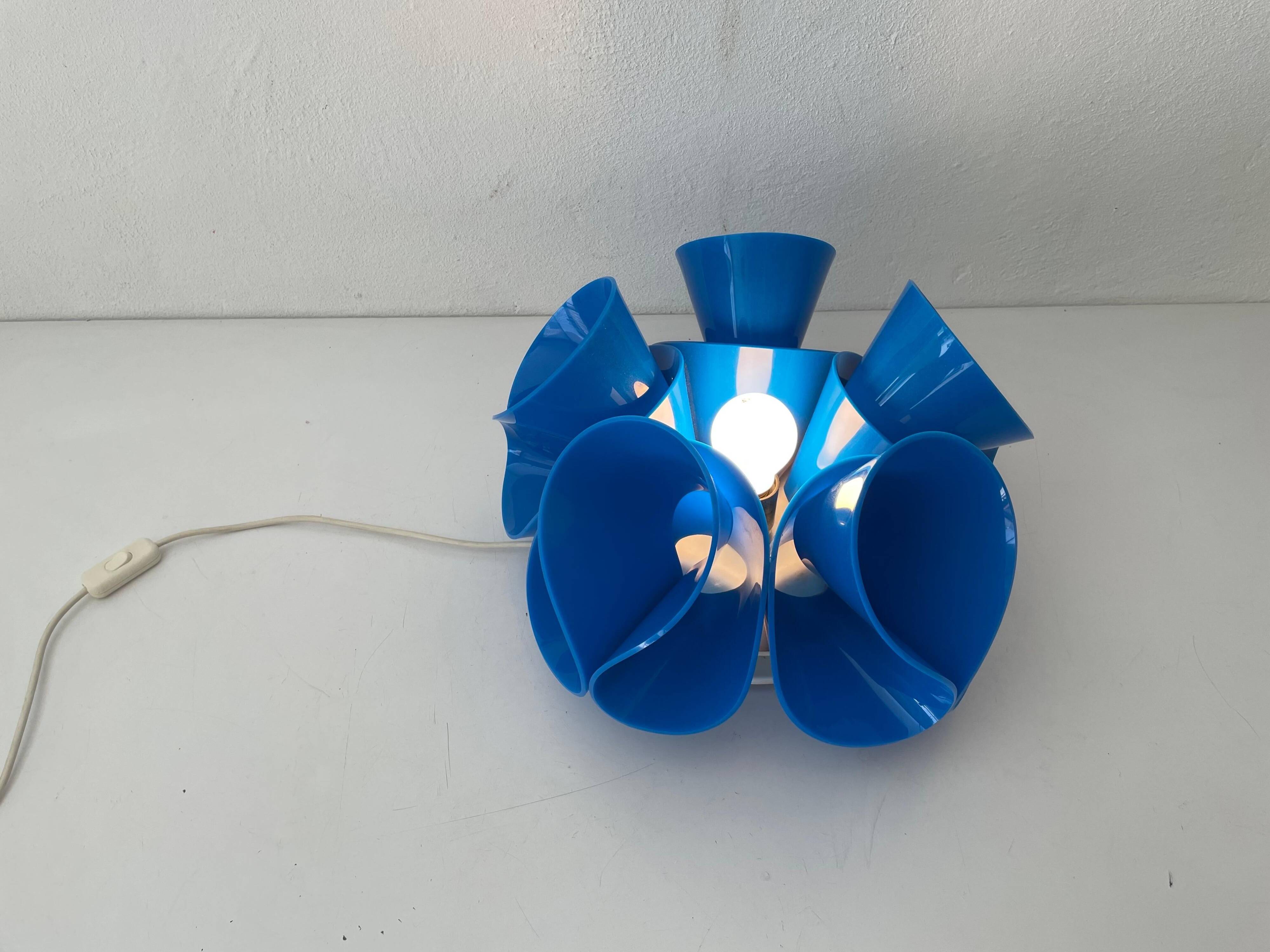 Blue plexiglass table lamp, Flower Design, 1970s, Italy.