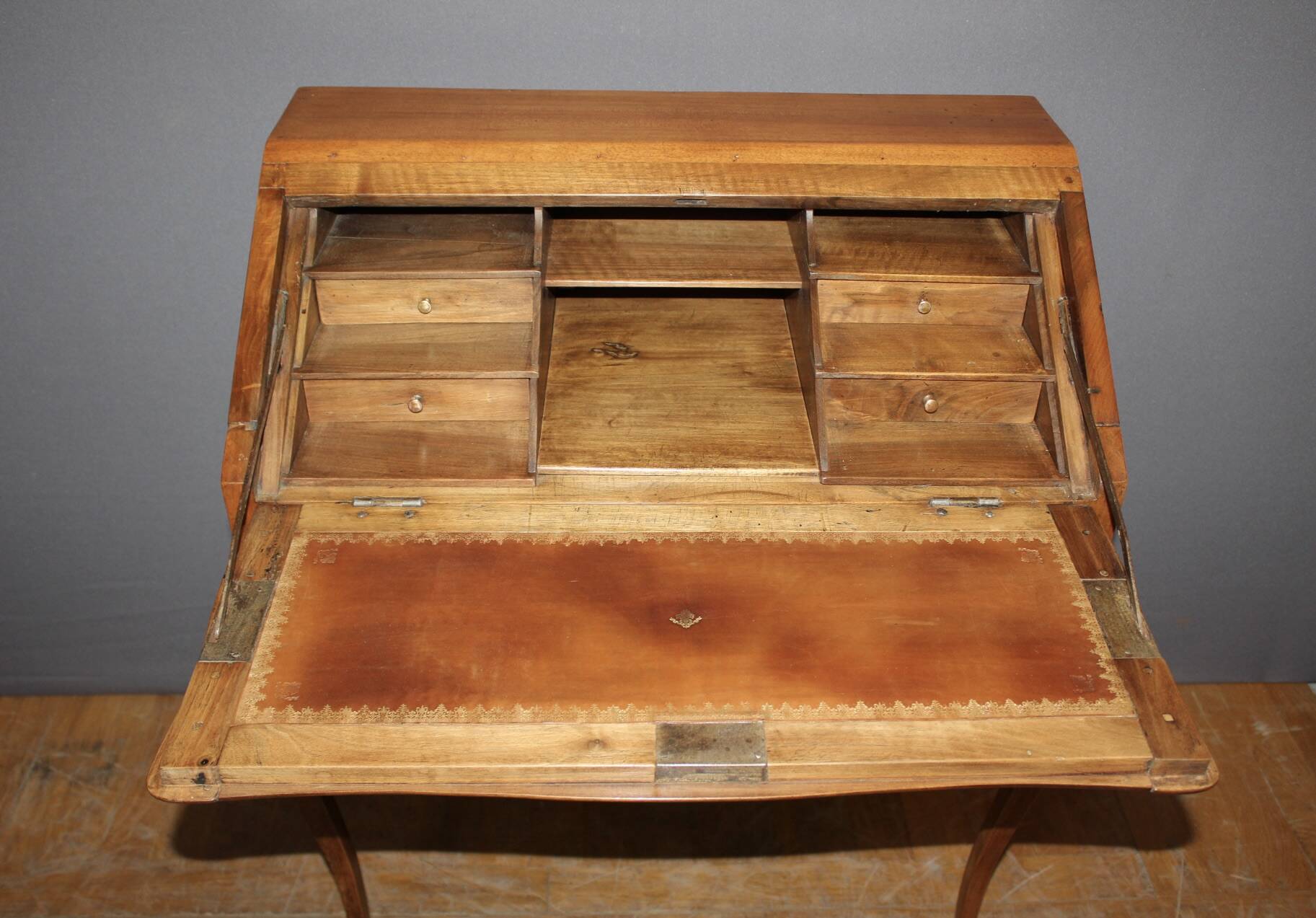 Louis XV donkey back desk in 18th century walnut