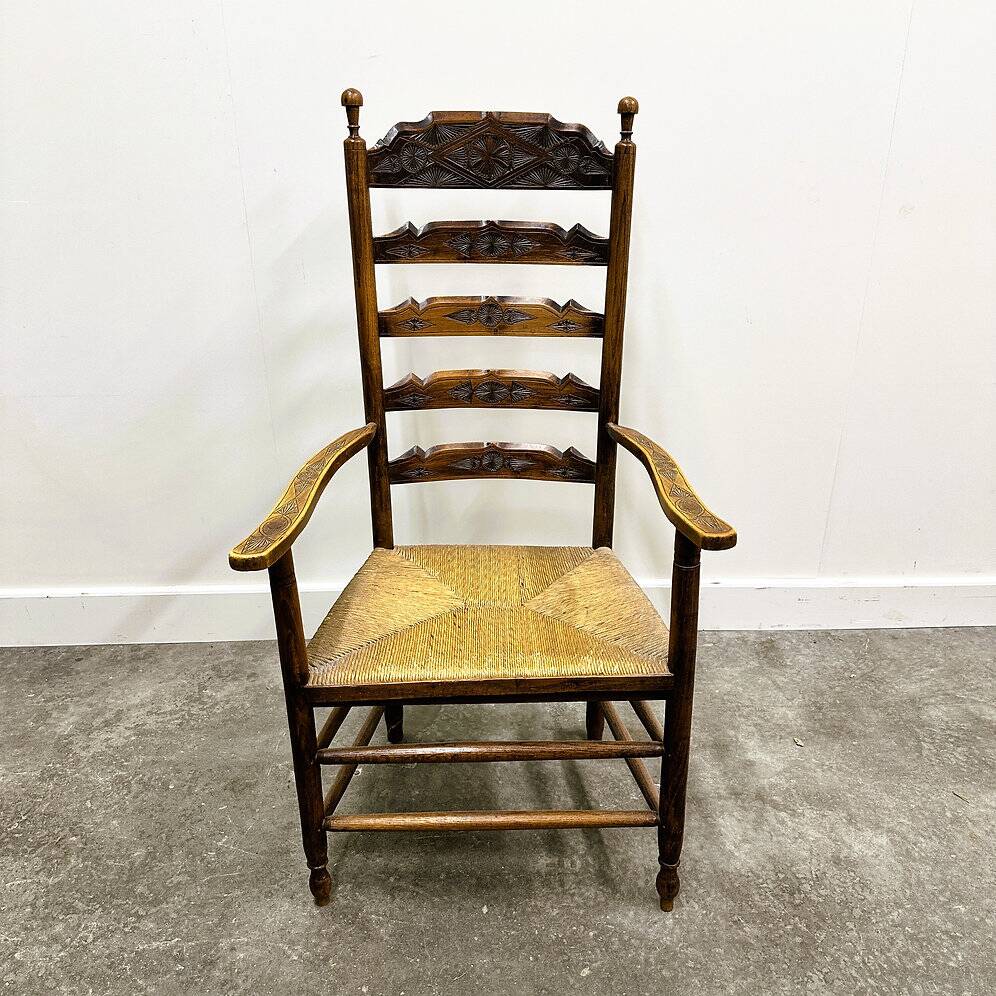 19th century handcrafted and carved ladder back chair, circa 1840s.
