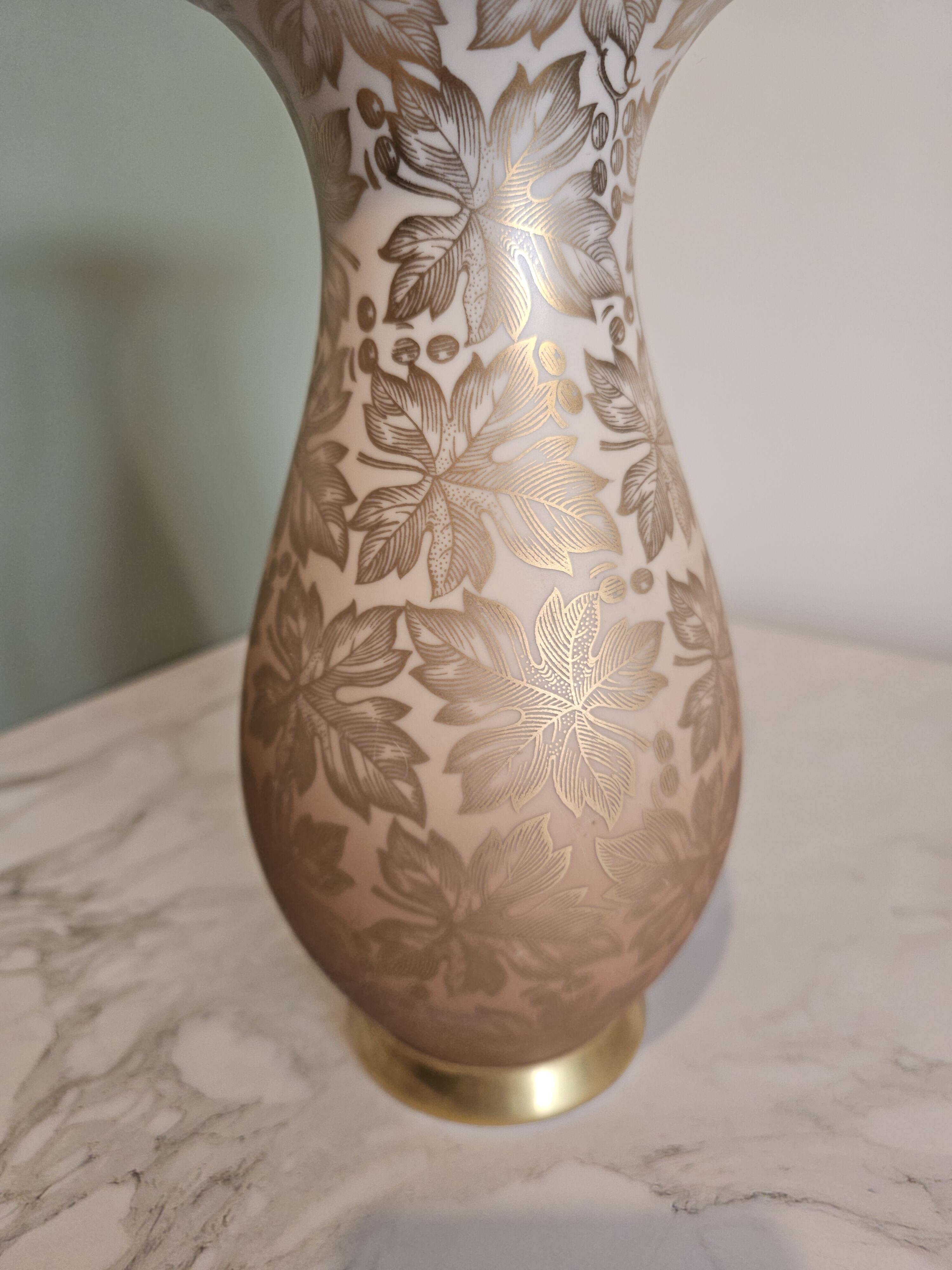 Porcelain vase with golden floral decoration by Johann Seltmann
