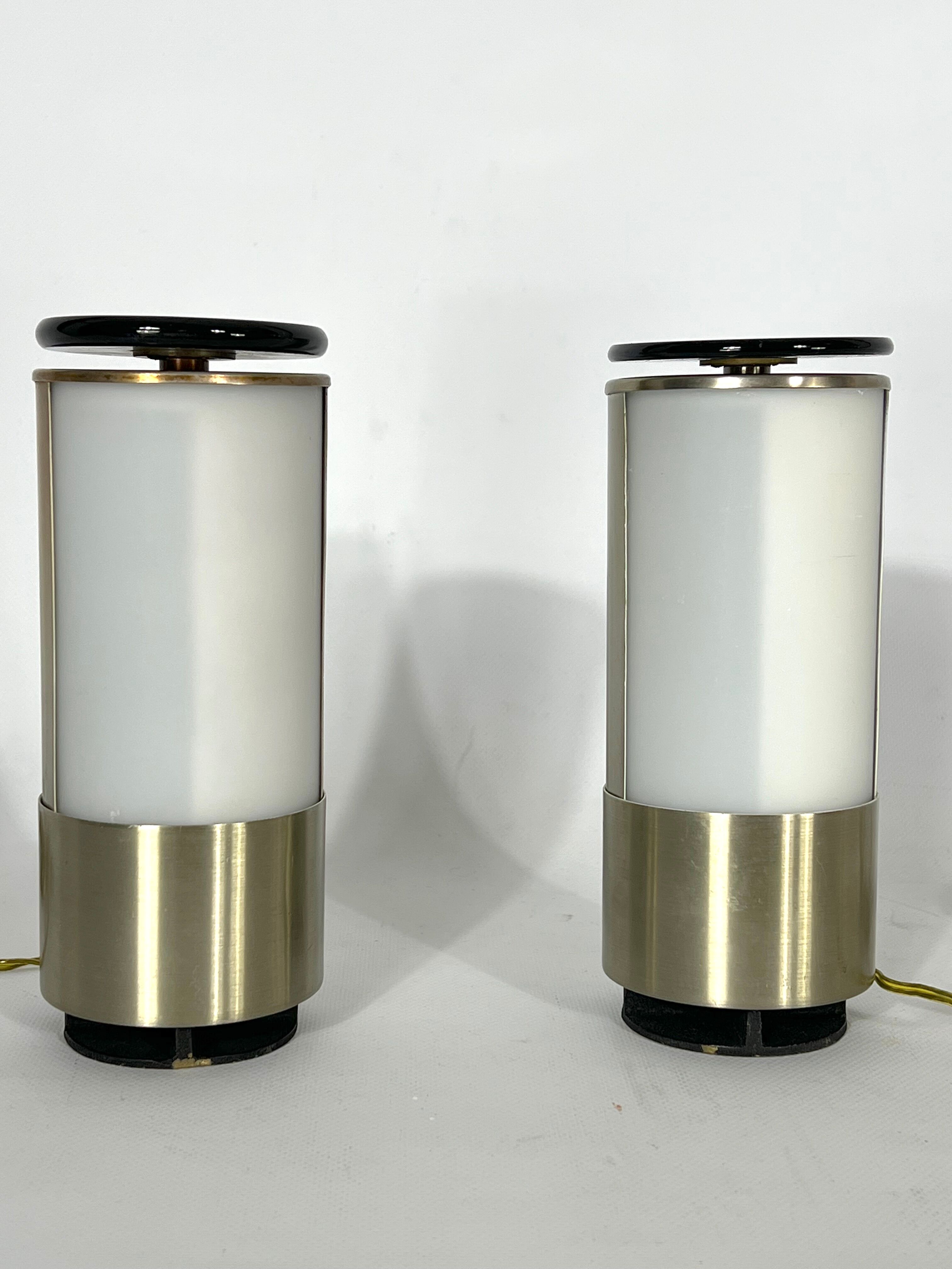 Mid-century modern pair of rare labeled Lumi Milano table lamps