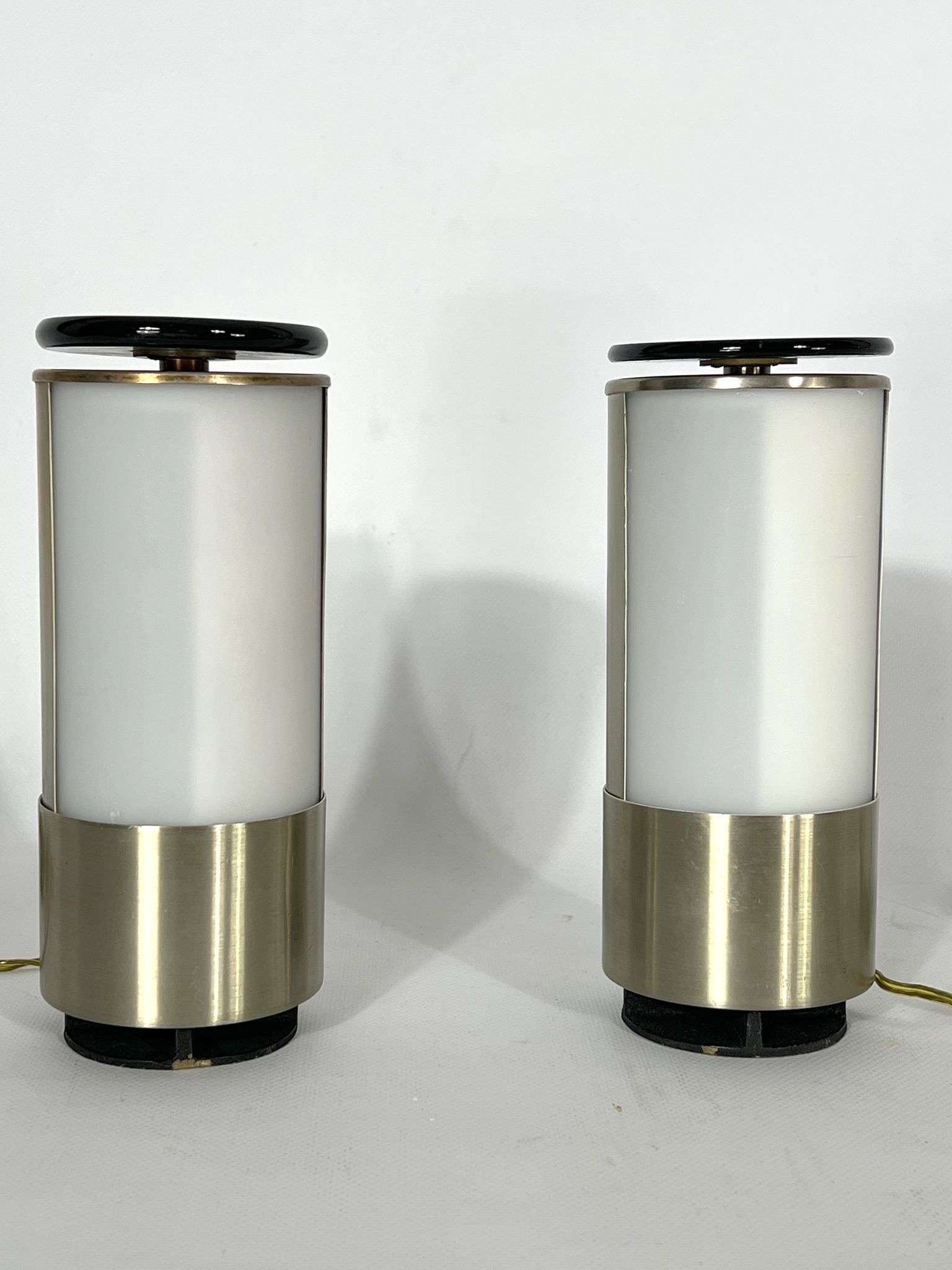 Mid-century modern pair of rare labeled Lumi Milano table lamps