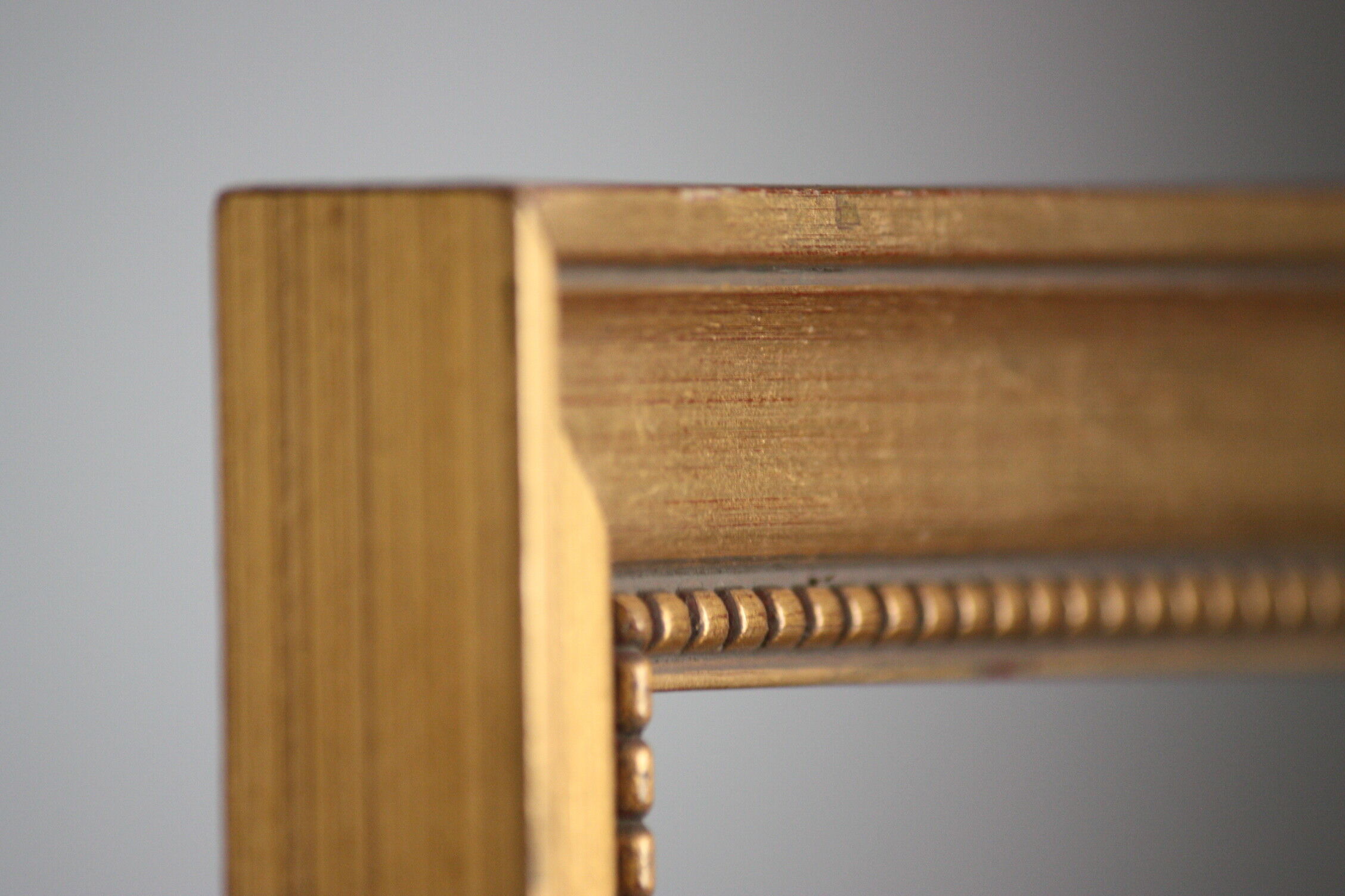 Carved and moulded gilded wood frame
