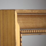 Carved and moulded gilded wood frame