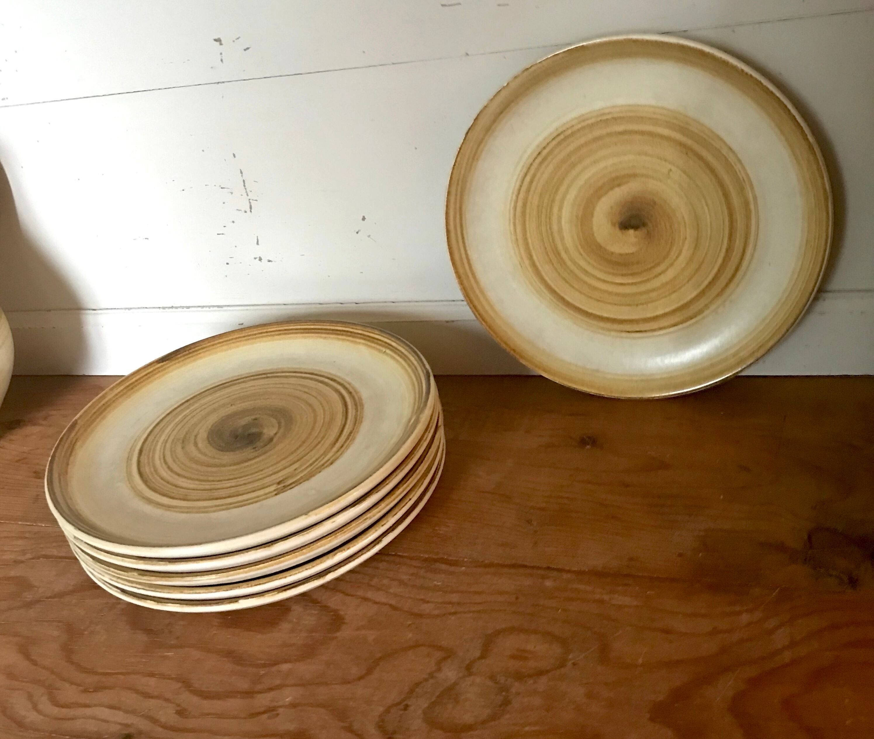 Six sandstone dessert plates by Longchamp