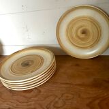Six sandstone dessert plates by Longchamp