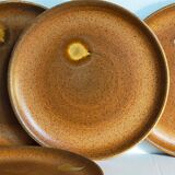 Quatre assiettes de potier en grès émaillé vintages