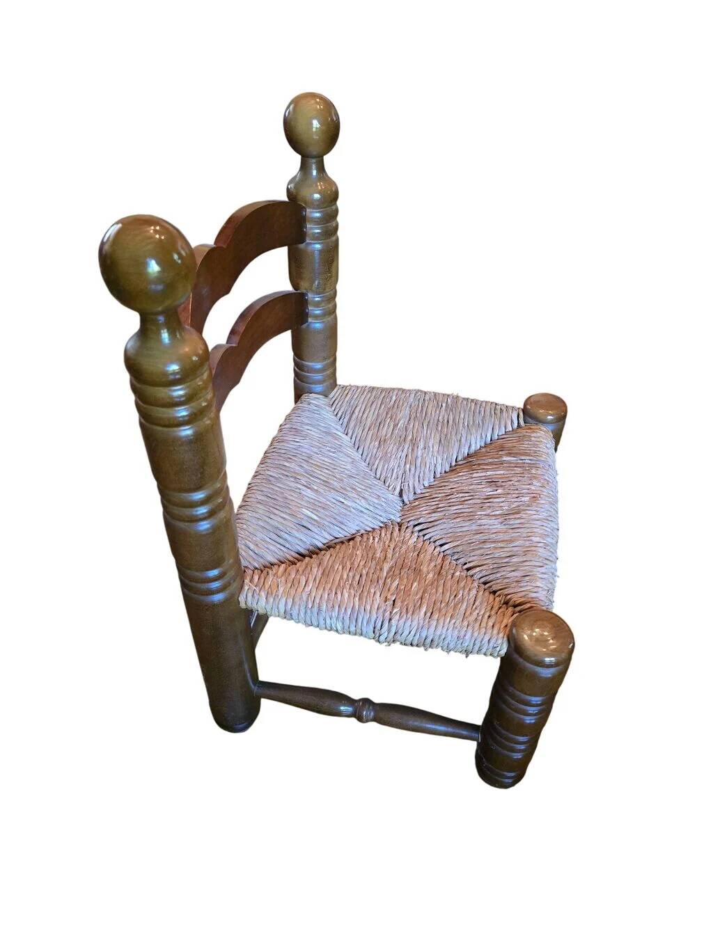Pair of low fireplace chairs in turned wood and straw, Charles style.