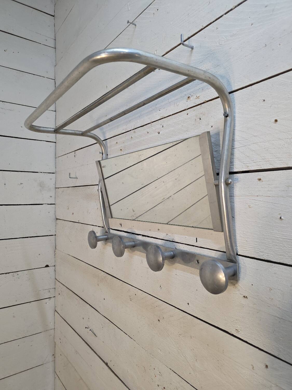 1960s swivel mirrored aluminum coat rack