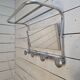 1960s swivel mirrored aluminum coat rack