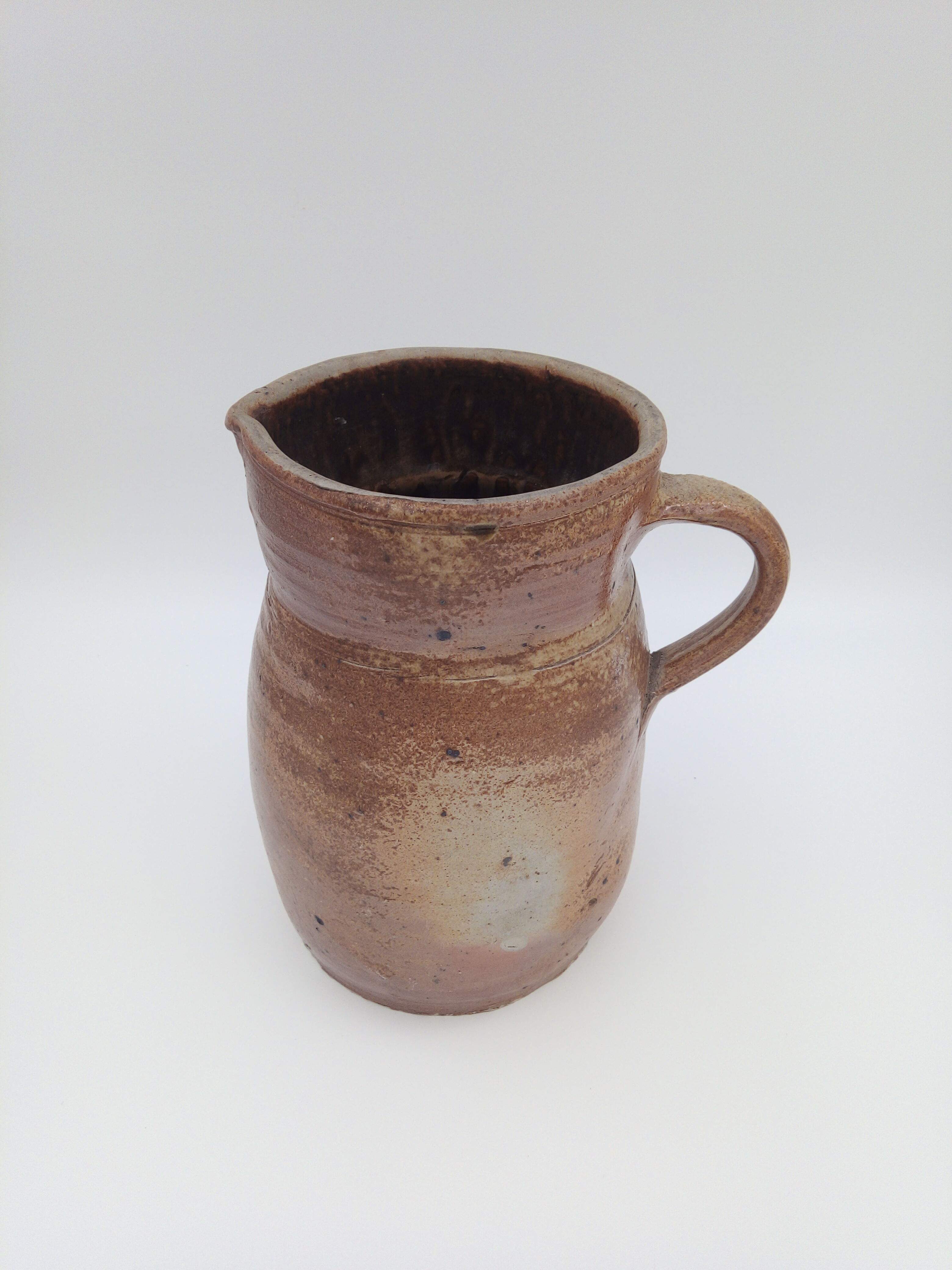 Pitcher in folk art sandstone