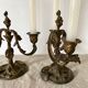 Pair of antique bronze candlesticks at the end of the table XIXth