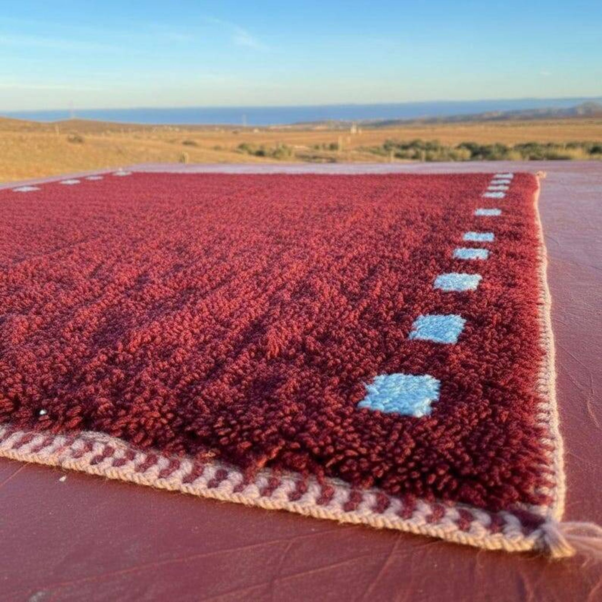 Traditional handmade Atlas wool Berber rug, size 150x250 cm.