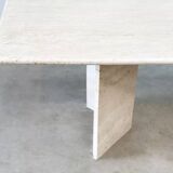 Sculptural travertine dining table
