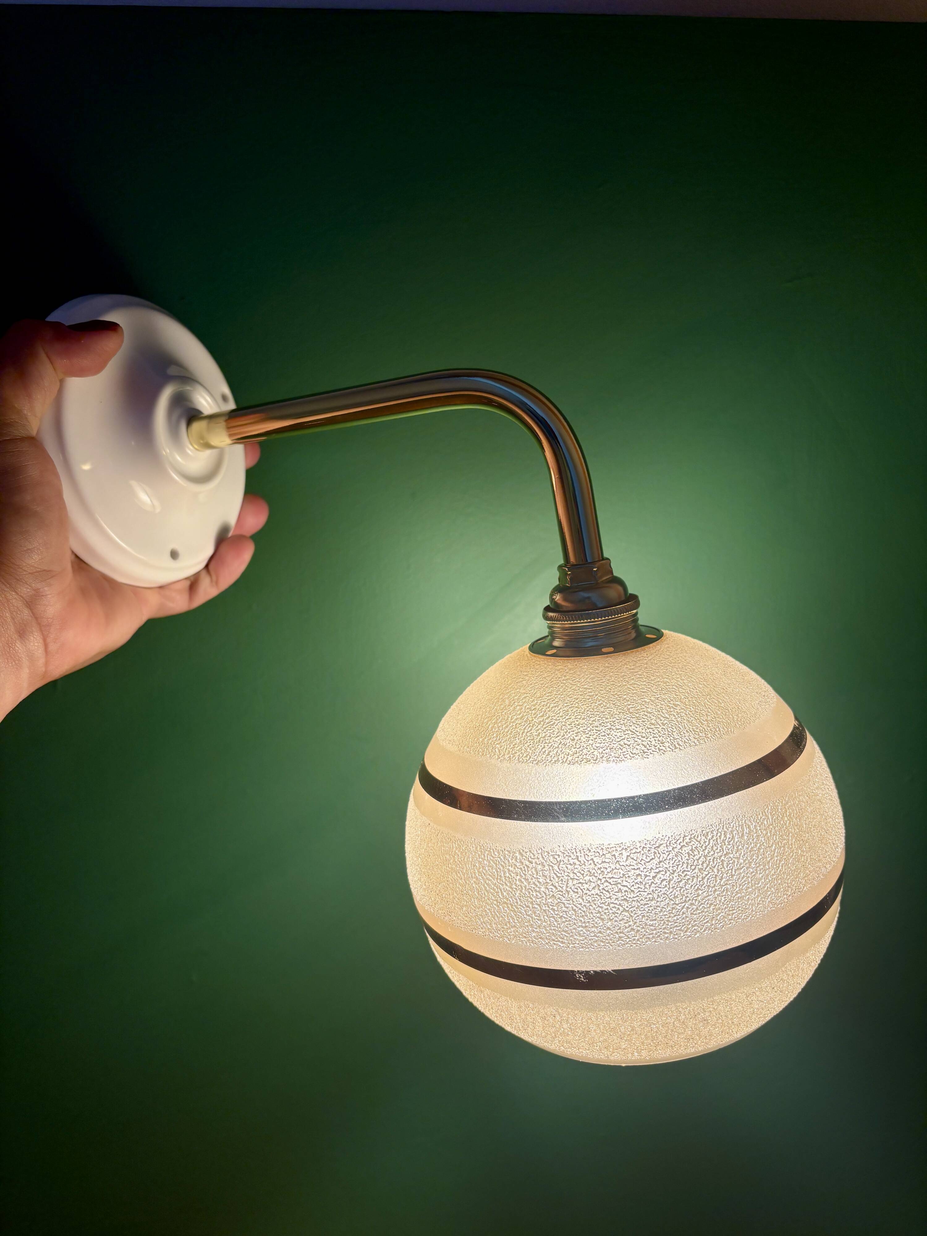 Vintage globe angled wall light in yellow and gold granite glass