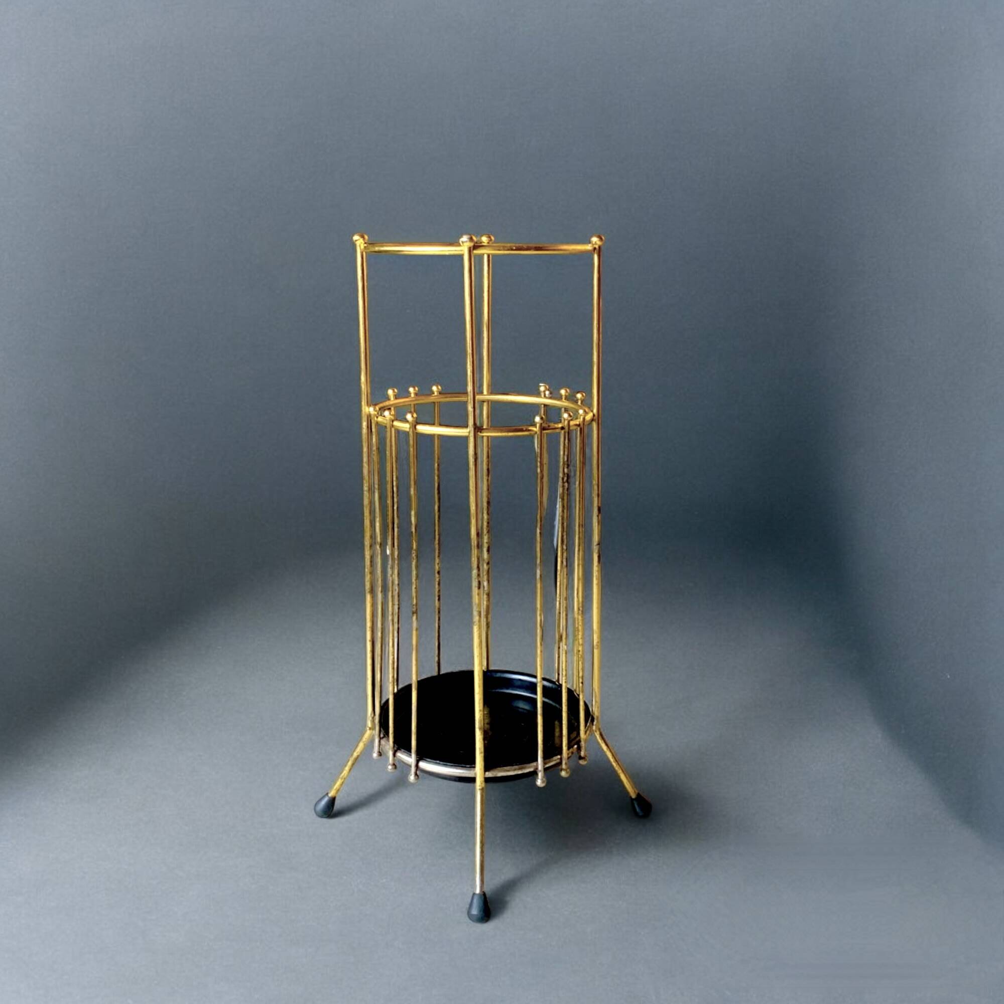 Vintage gold metal umbrella stand