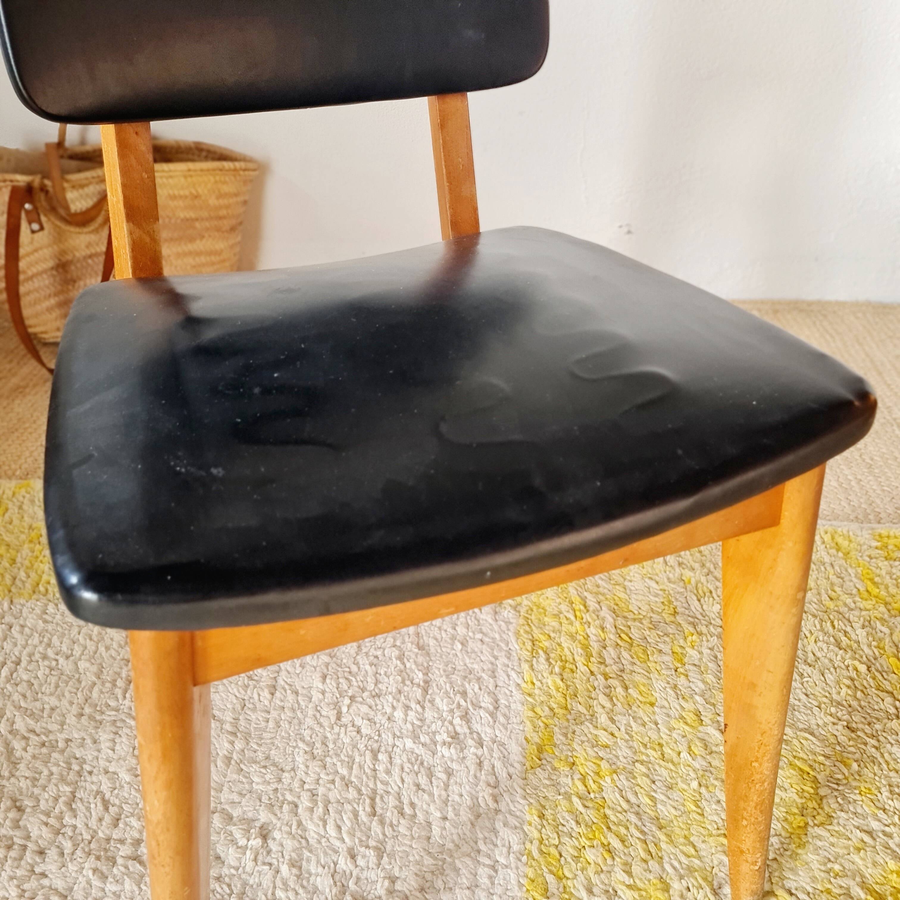 Vintage Scandinavian chair with compass legs.