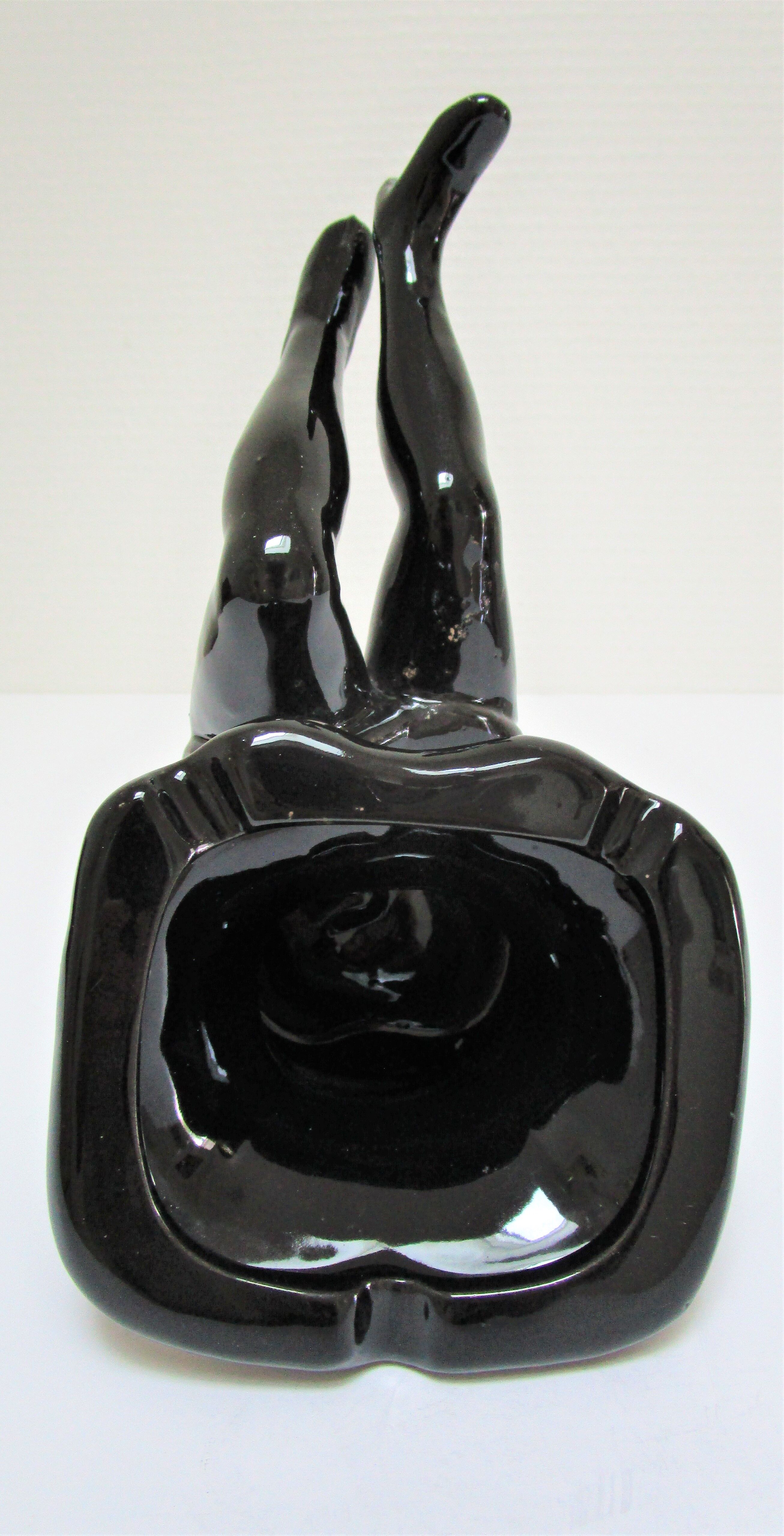 Anthropomorphic ashtray legs ceramic black design 80s