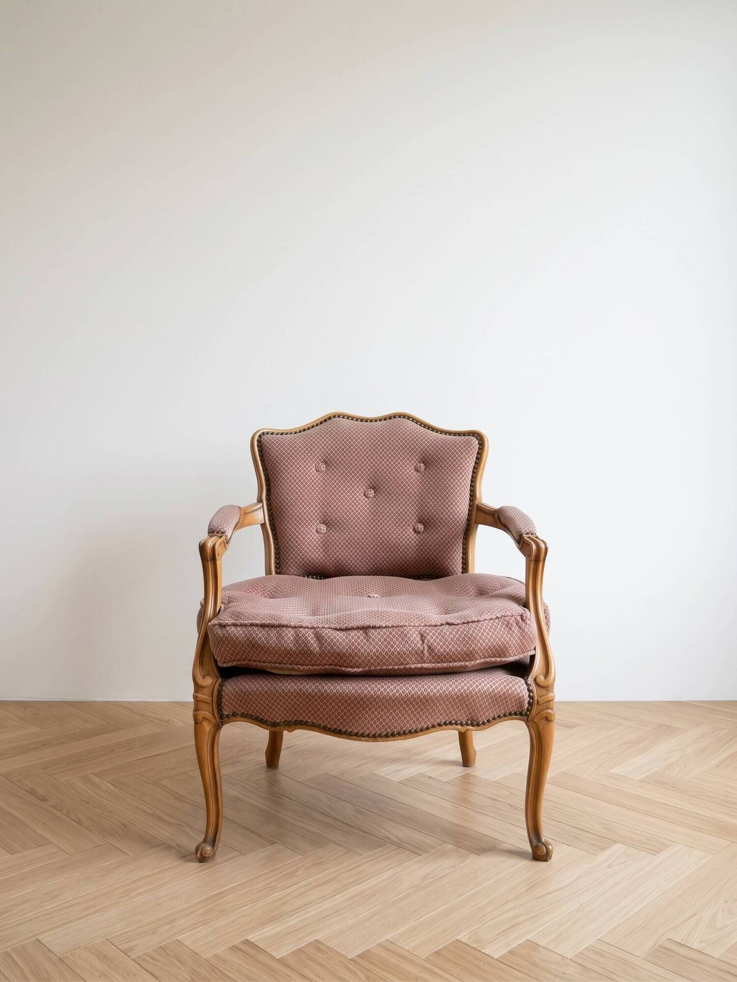 Pair of antique Louis XV armchairs in wood and pink fabric.