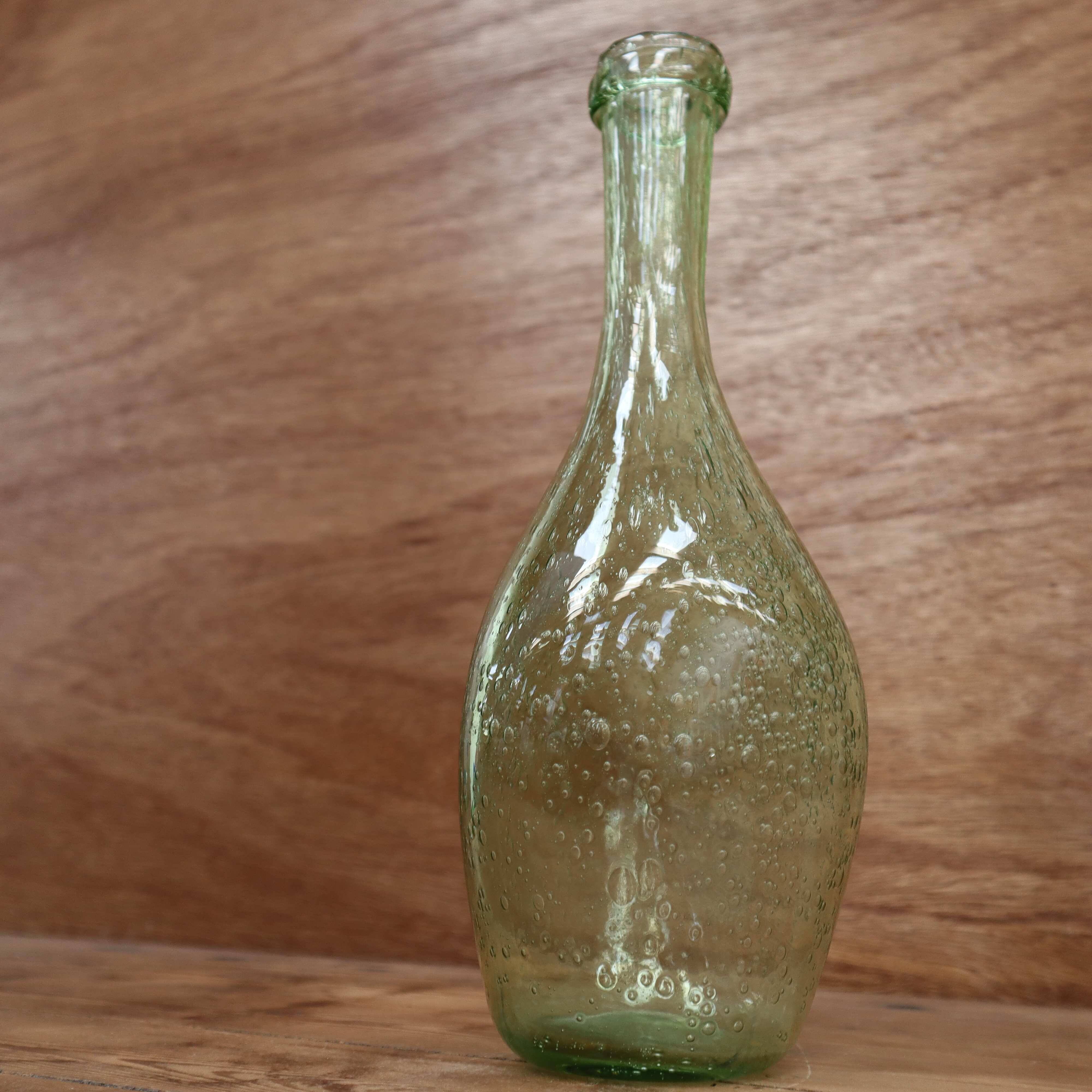 Biot water green colored bubble blown glass bottle