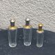 Three bottles of crystal perfume signed Marcel Rochas old france
