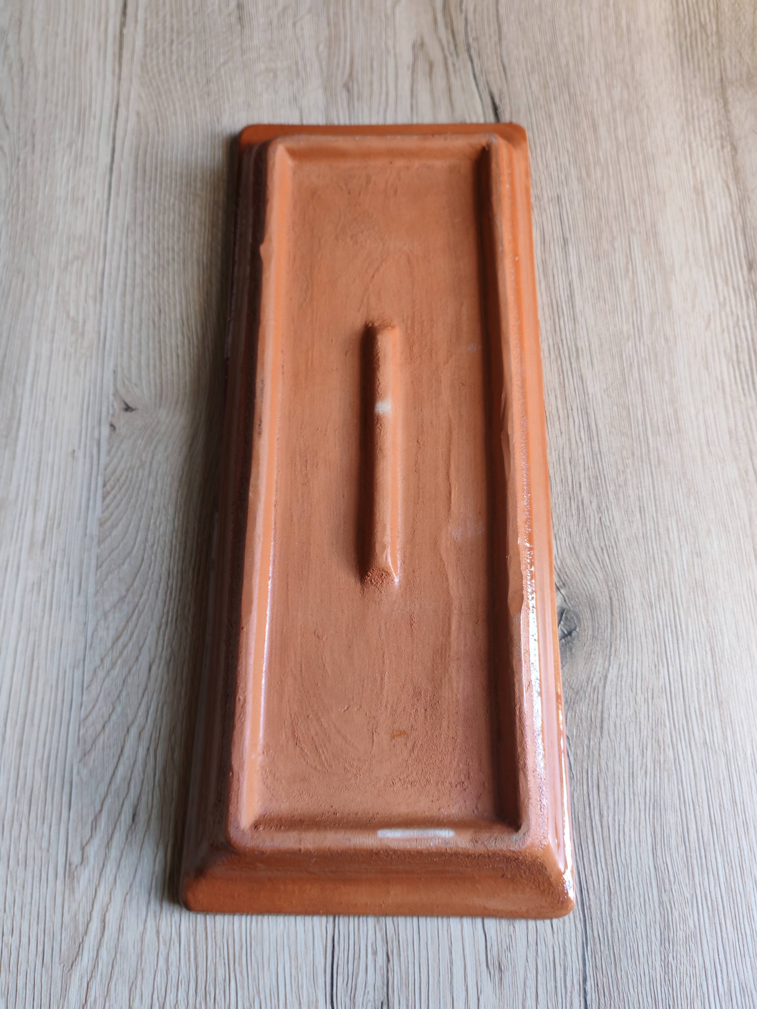 Terracotta plate signed P.Boy, glazed artisanal ceramics.