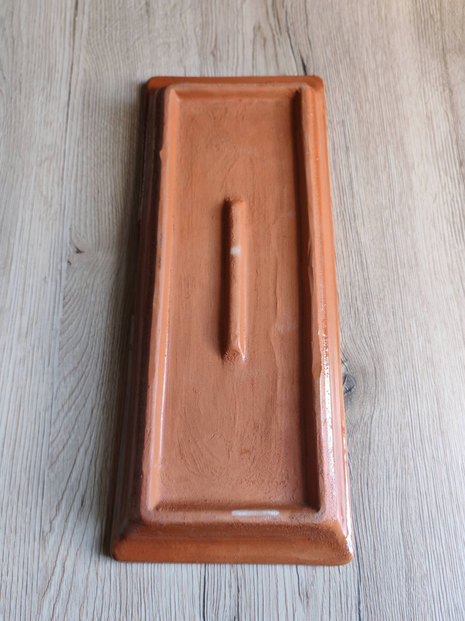 Terracotta plate signed P.Boy, glazed artisanal ceramics.