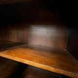 Vintage wooden display cabinet with sliding doors.
