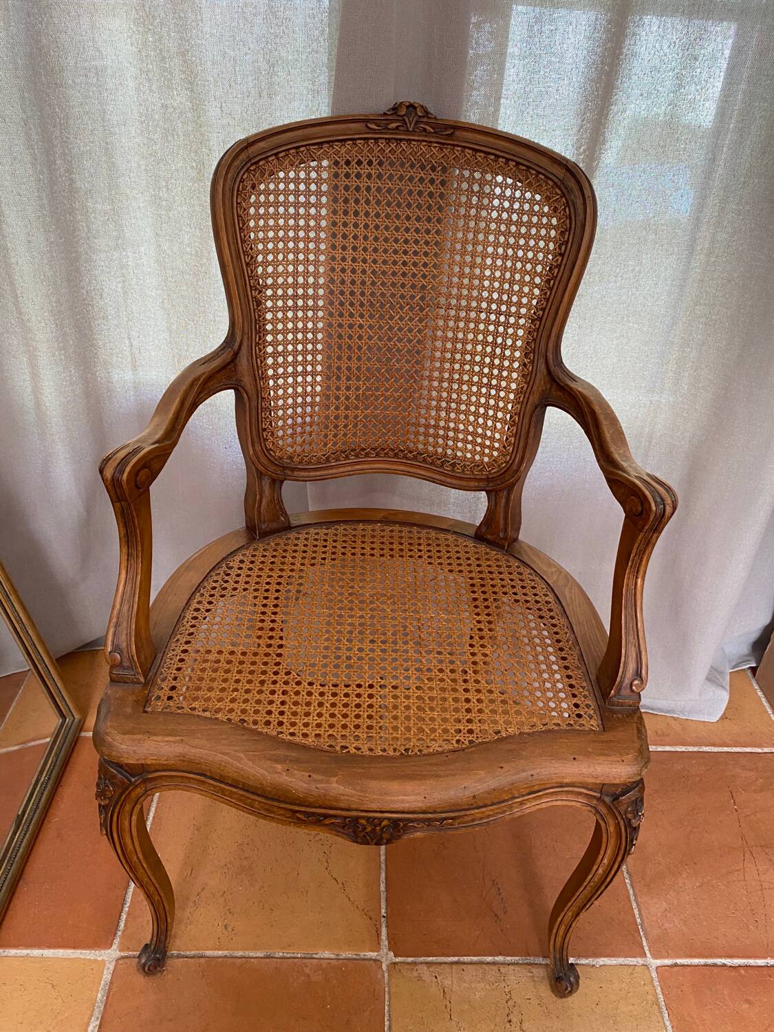 Louis XV style caned armchair