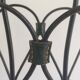 Magazine rack in leather and black lacquered metal. Attributed to Jacques Adnet