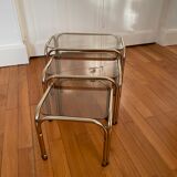 Pull-out tables in vintage smoked glass