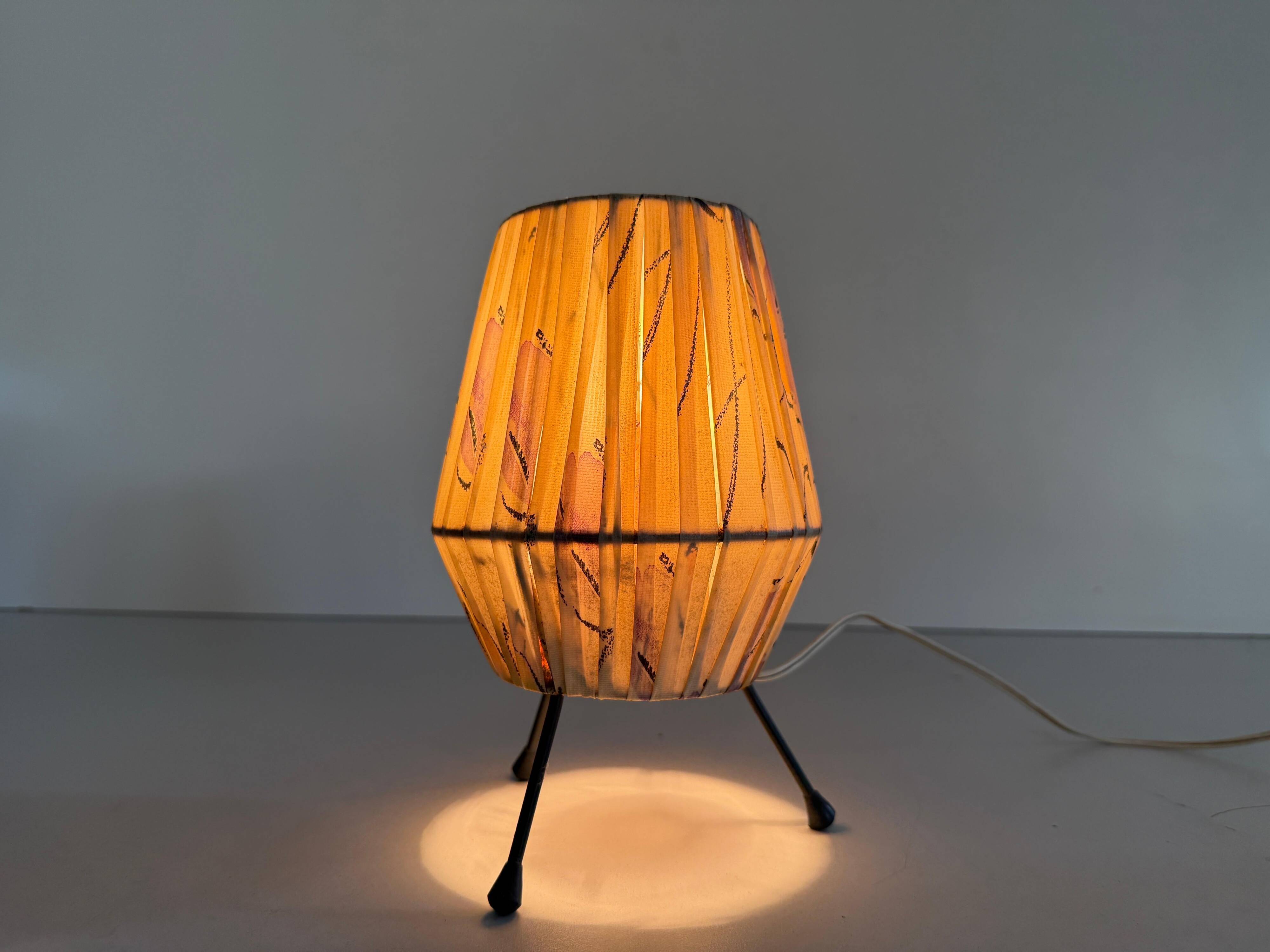 Pair of table lamps with plastic shades and tripod base, 1960s, Italy