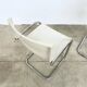 Pair of white moulded shell chairs with chrome tube — Space Age 70s