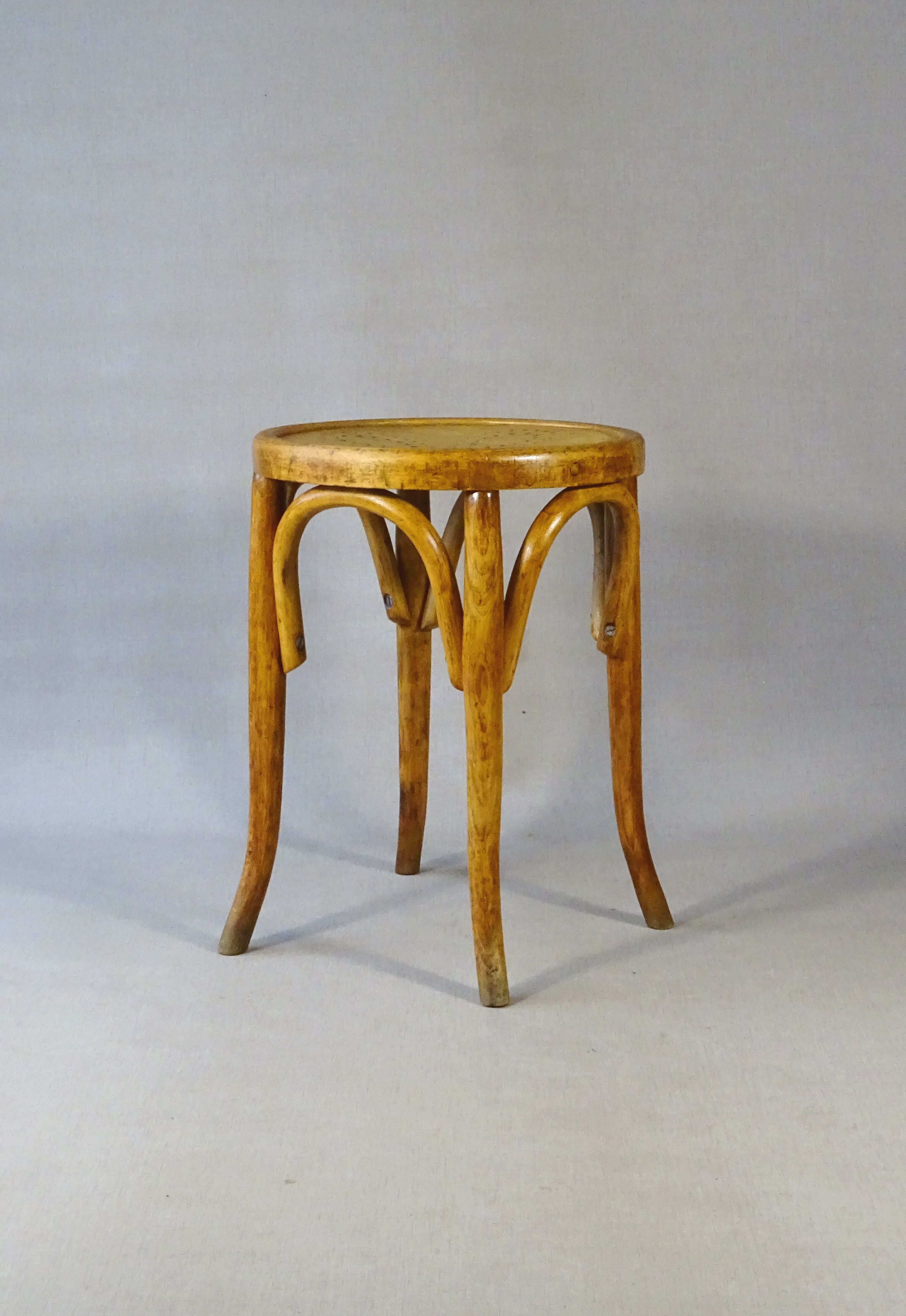 Curved wood bistro stool perforated seat 1920