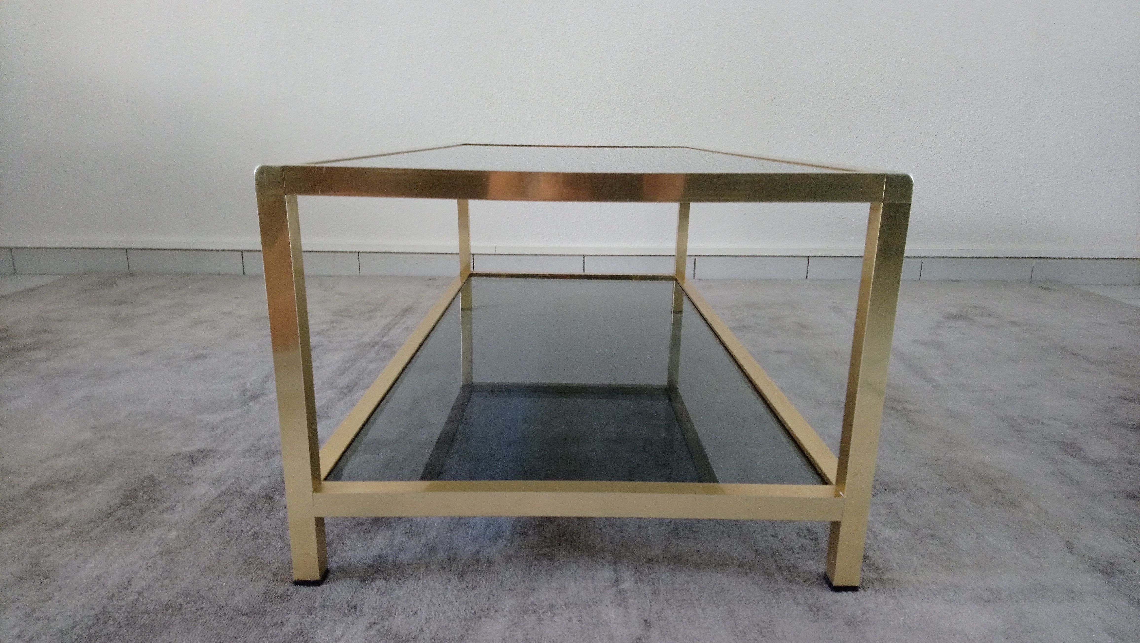 Table low brass and smoked glass 70s
