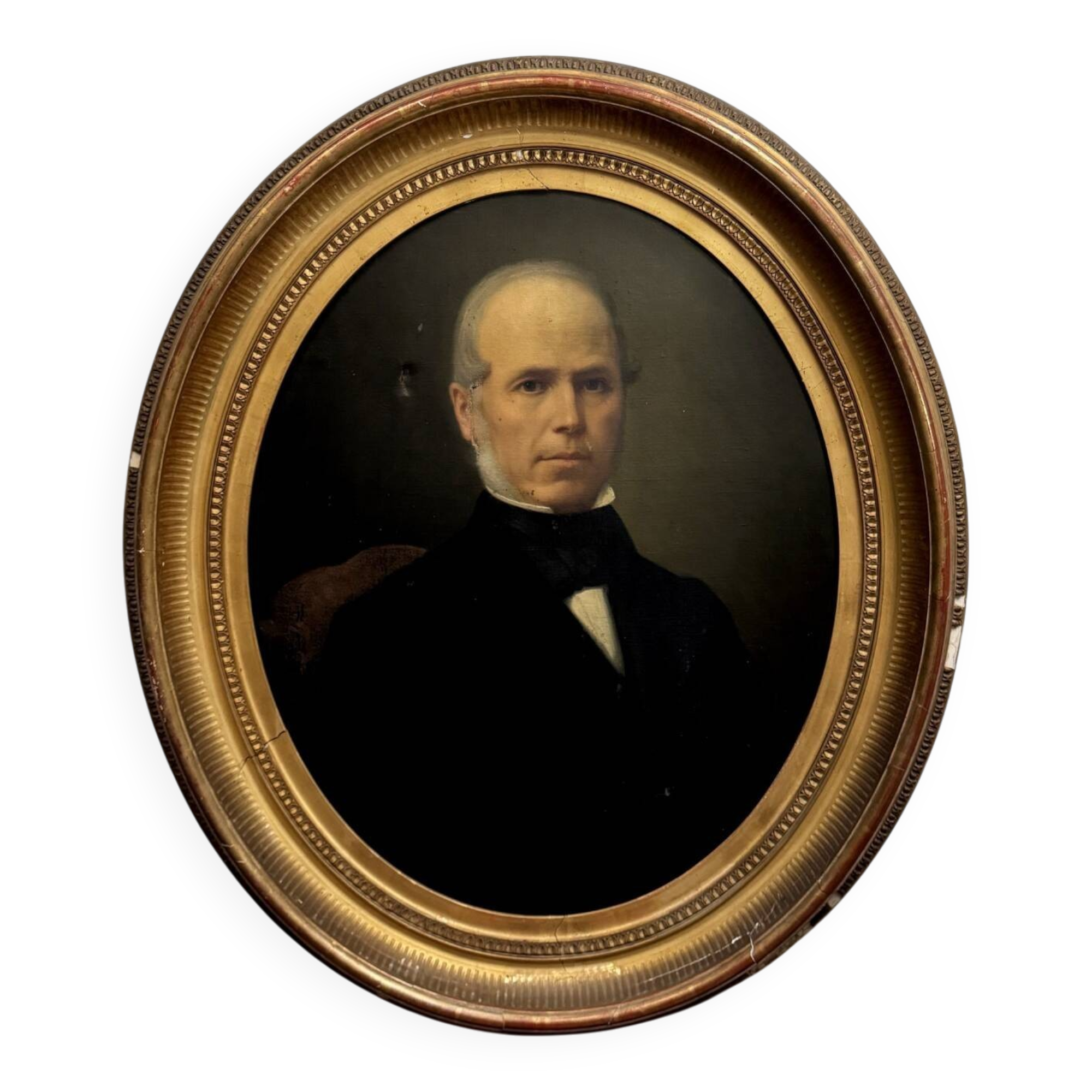 Oil on canvas portrait of a man, late 19th century, oval frame gilded with gold leaf.