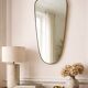 Miroir Art Déco en laiton de forme libre 78 cm