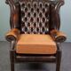 Chesterfield armchair with armrests