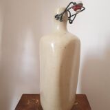 Triangular stoneware bottle
