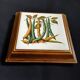 Dessous de plat ancien avec motif botanique