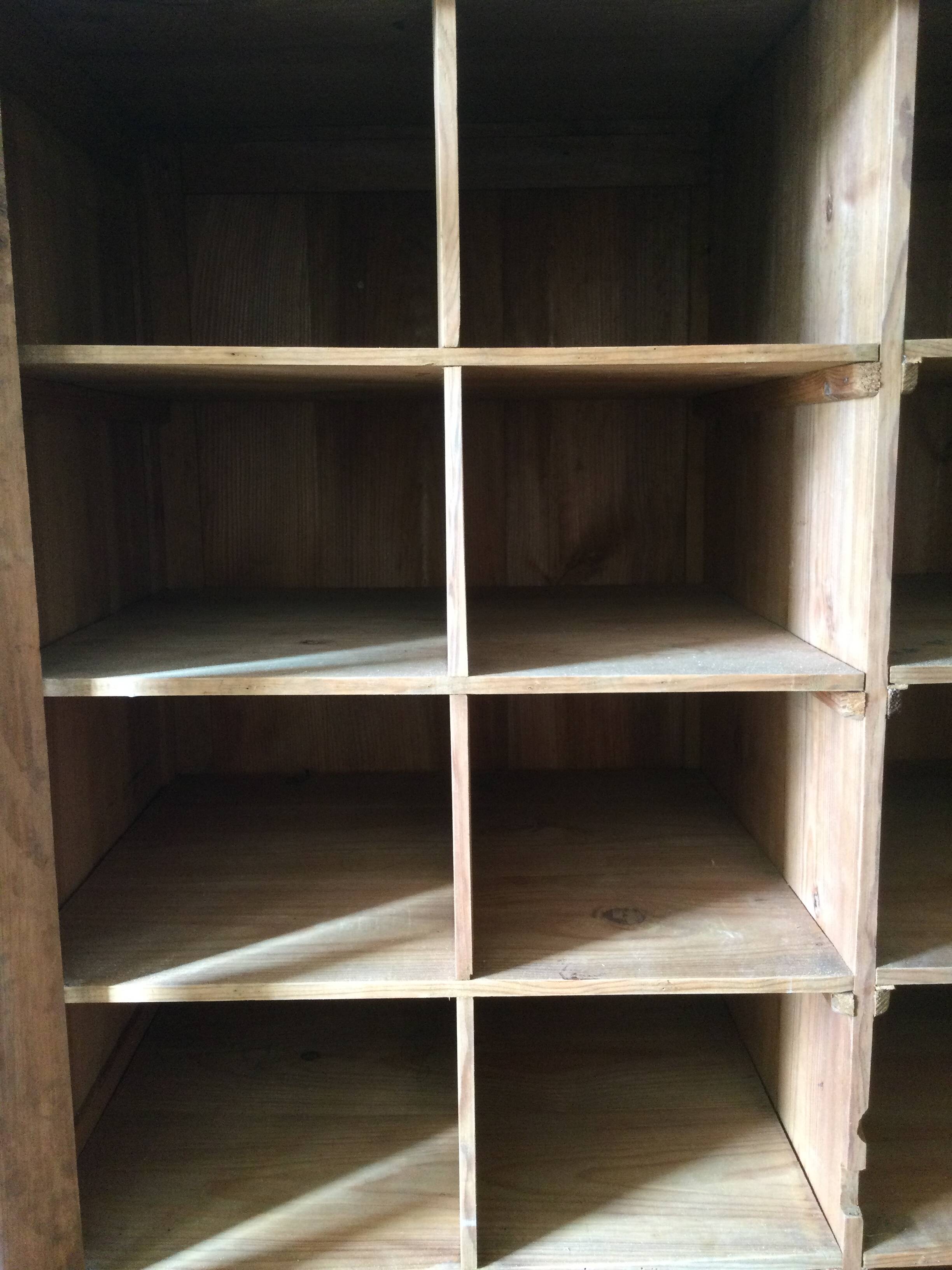 Antique Parisian wardrobe with interior compartments.