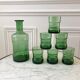 Set of a decanter and 6 glasses colored green bottle 70s