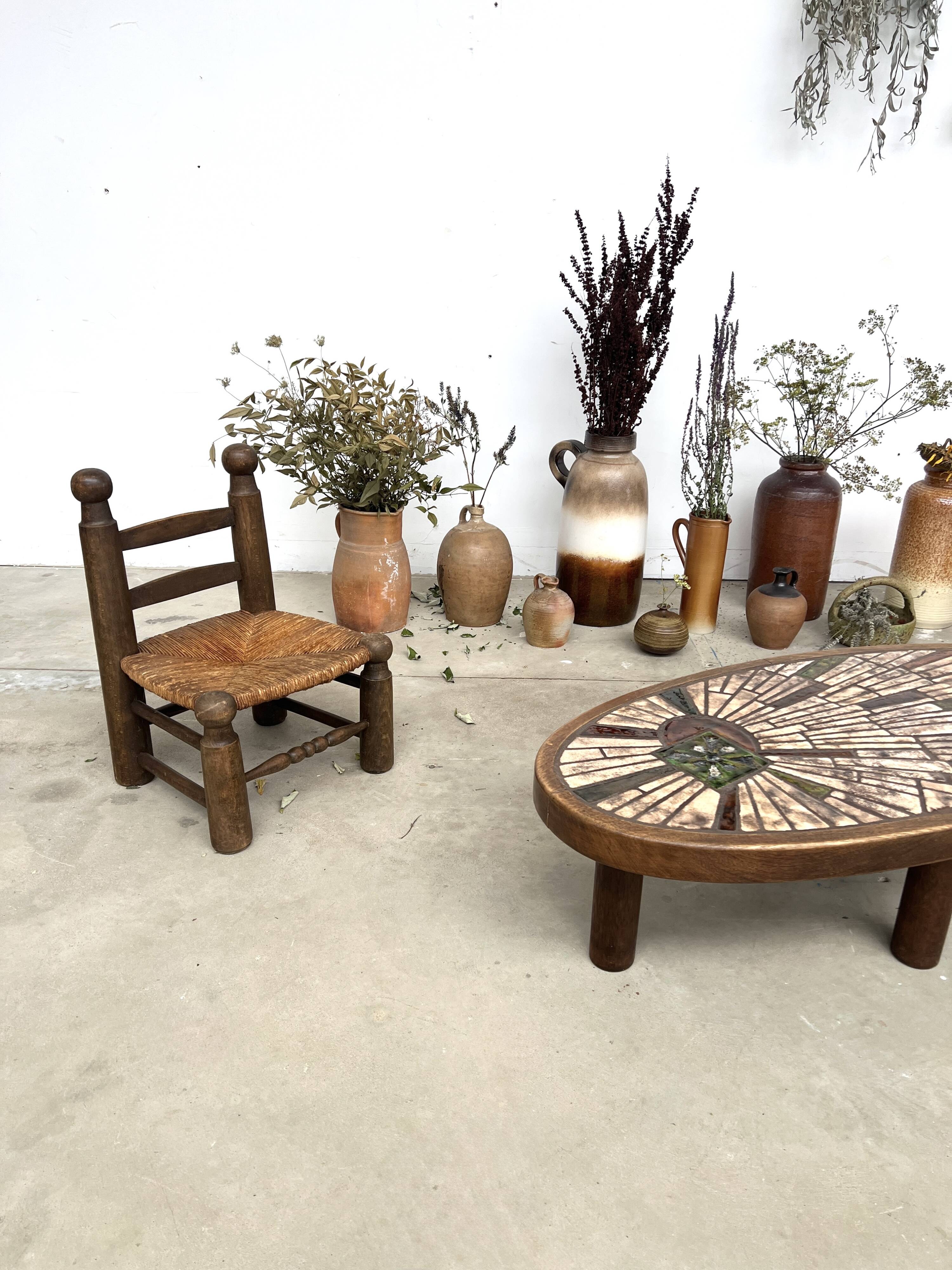 Brutalist chair in wood and straw