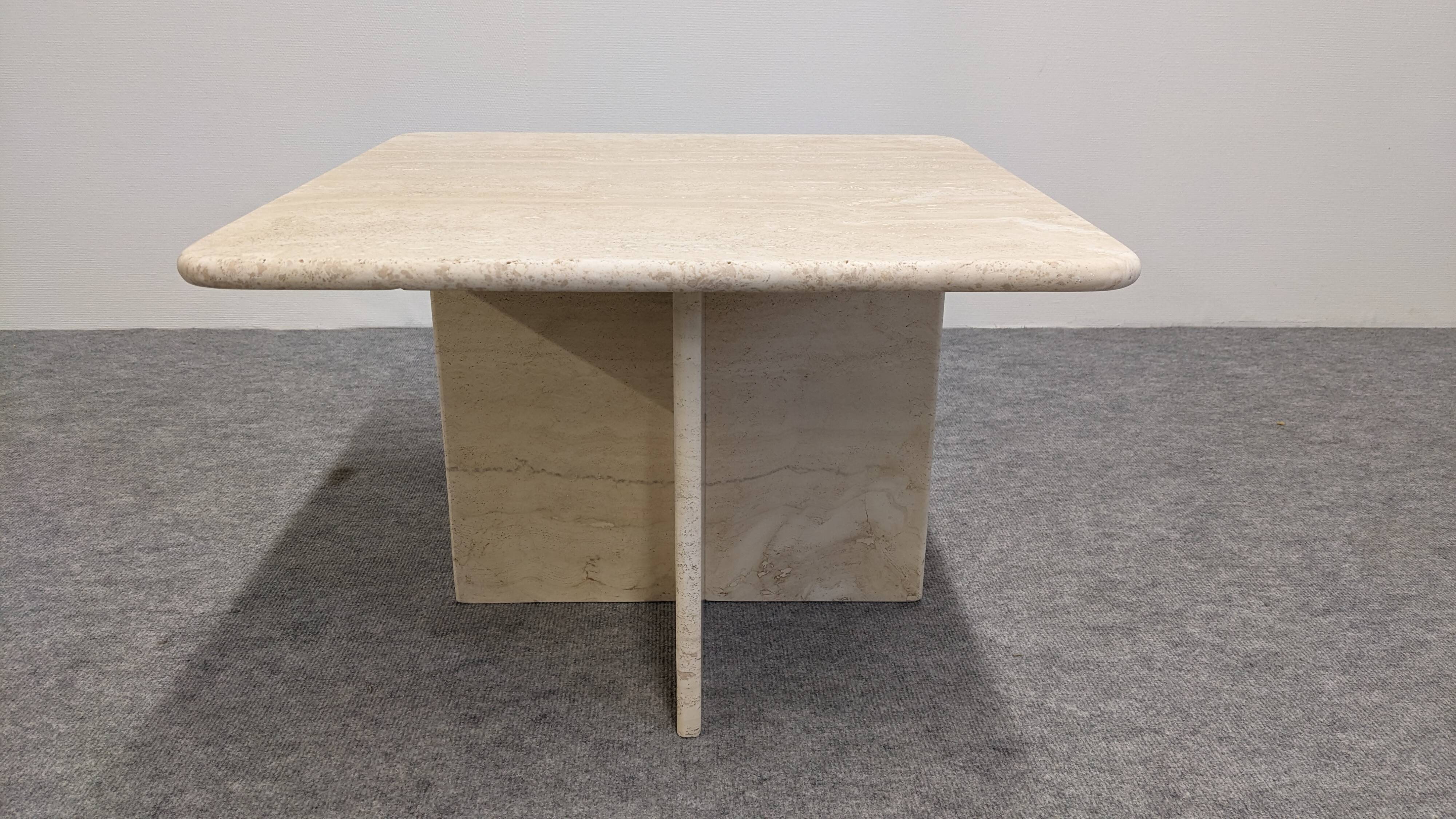 Coffee table or side table in travertine, Italy around 1970.