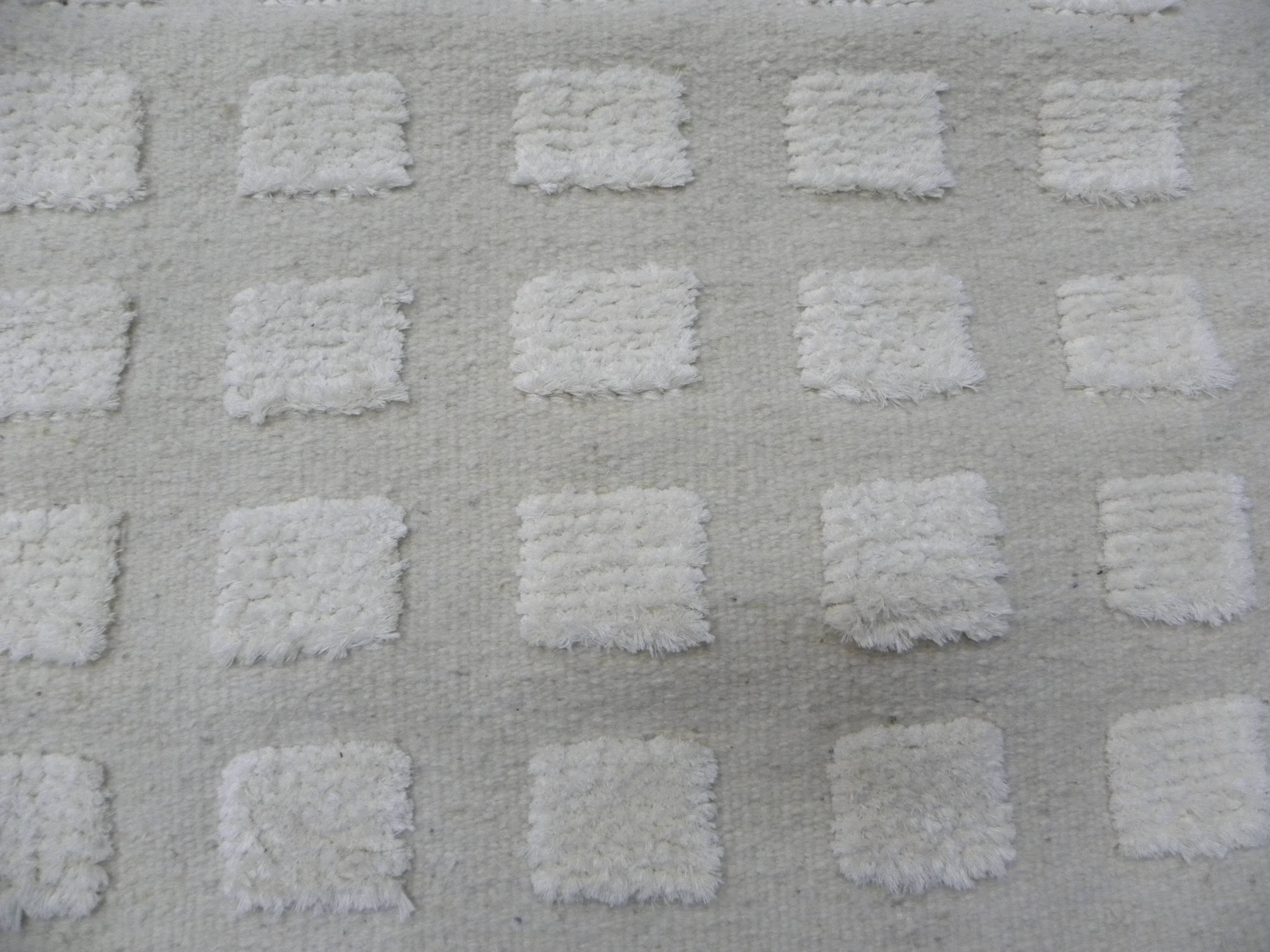 Tunisian Berber rug handwoven from pure sheep wool.