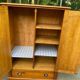Small wardrobe / bonnetière in solid honey pine with 2 doors and 1 drawer.